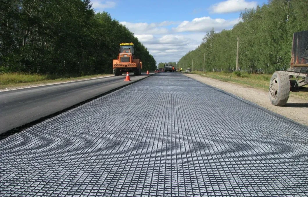 Composite Biaxial Fiberglass Geogrid With Nonwoven Geotextile For Soil Reinfocement/Road Construction Material Geocompos 9